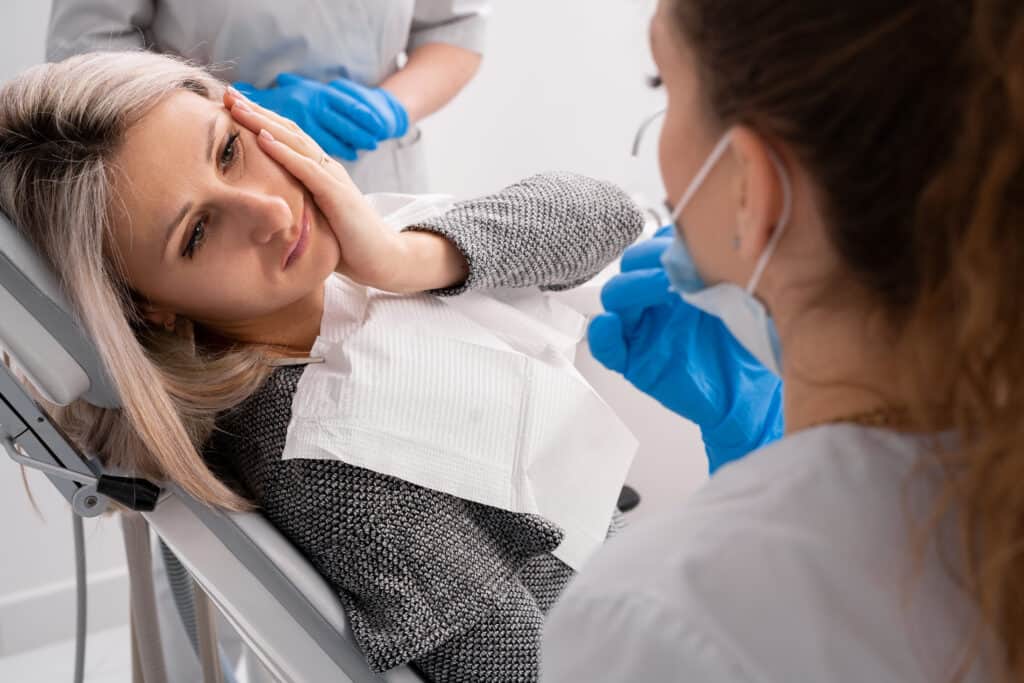 Patient receiving prompt, compassionate emergency dental care for sudden tooth pain in Park City.