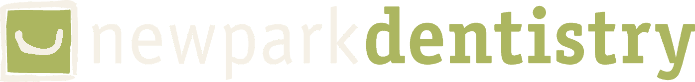 Newpark Dentistry brand logo displayed against a dark background.