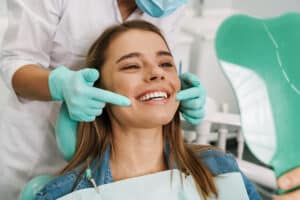 Smiling patient representing the Newpark Dentistry new patient special offer in Park City.